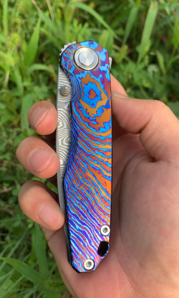The new Rhaegal full dress is now available.   RWL34+PMC27 Damascus Steel+Titanium Damascus